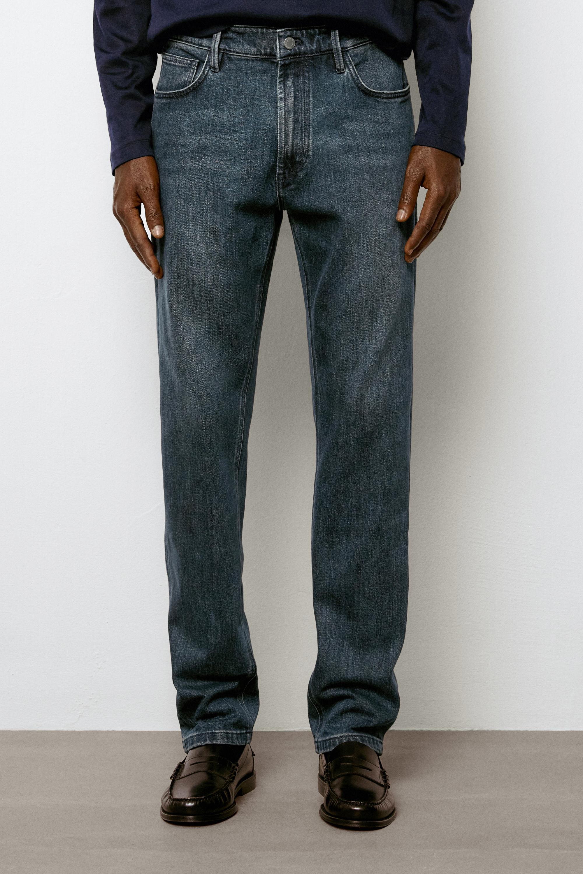 Enzymatic tapered fit jeans